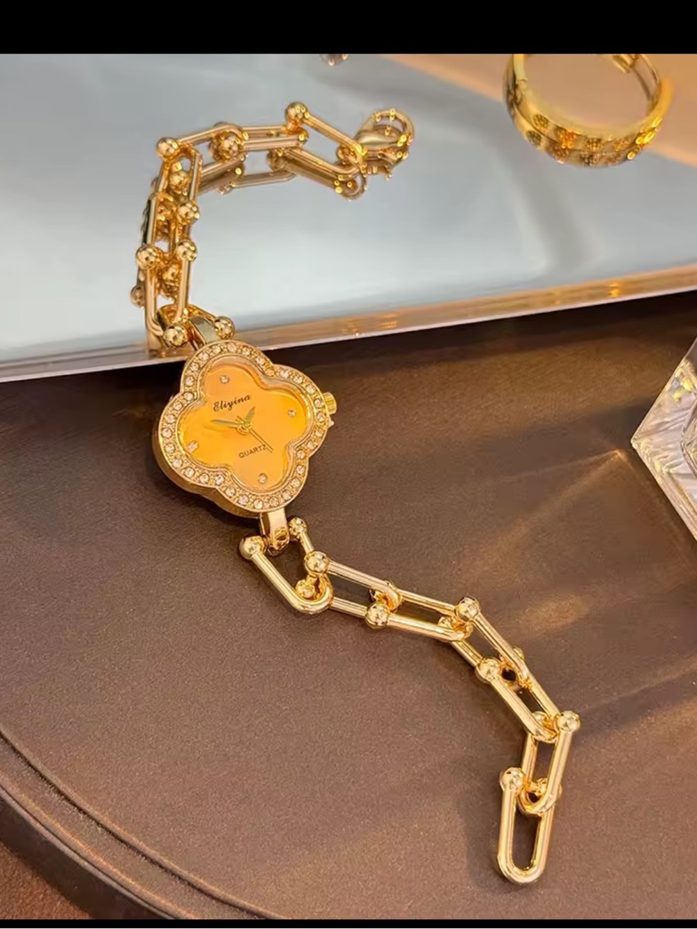 Gold-Tone Clover Quartz Watch with White Dial and Crystal Accents - Picture 5 of 15